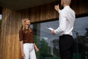 Homebuyer reviewing inspection findings while evaluating a property purchase.