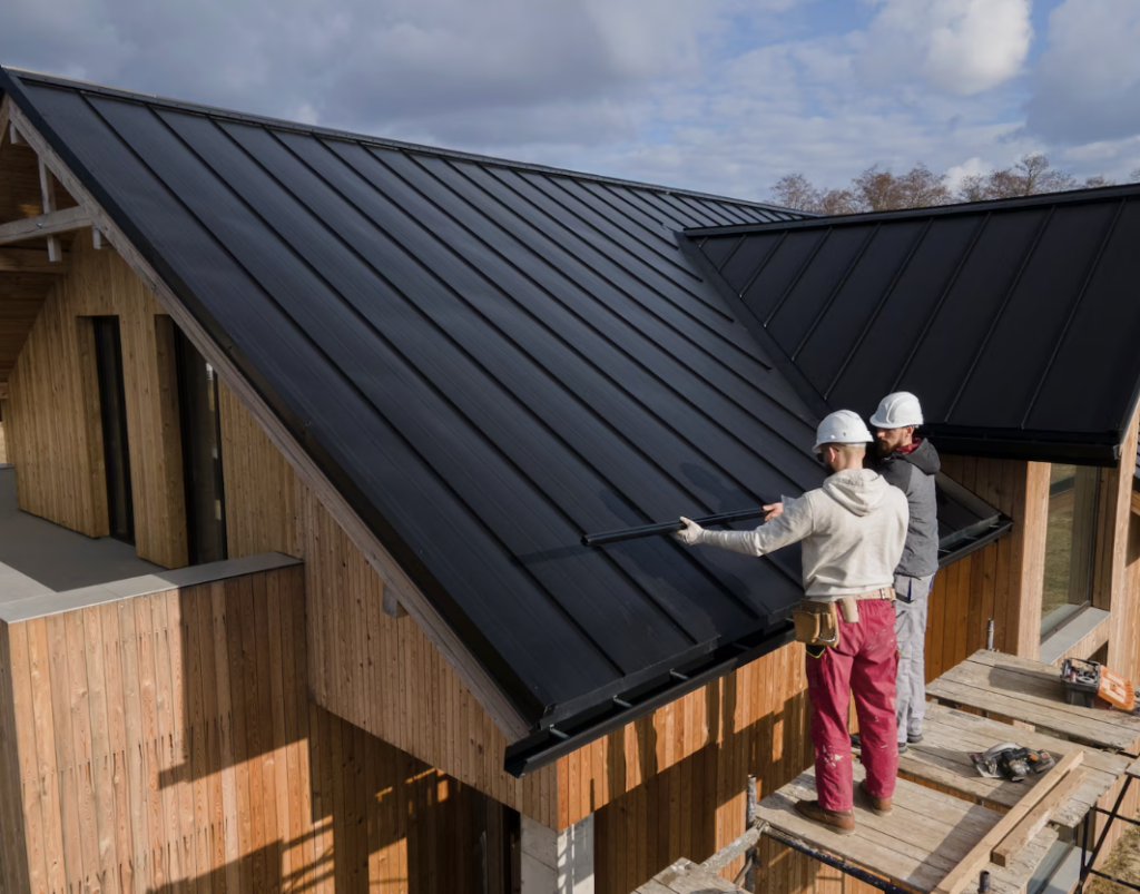 Roofing professionals inspecting a residential roof before a home purchase